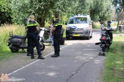 Licht gewonden na frontale botsing snorscooters